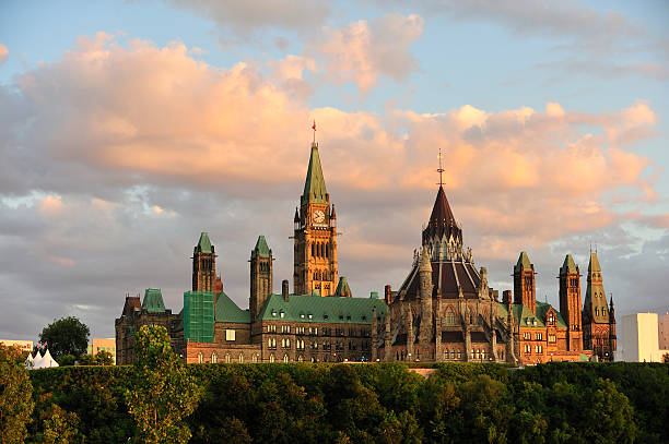 Ottawa, Canada - August 13, 2025: View of the East Block of Parliament Hill with the Laurier statue