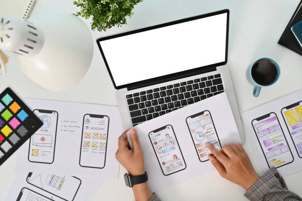 istock Top view of UX designers working on development project for mobile application at workplace 1848755681