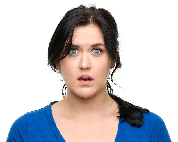 istock Nervous Young Woman Staring at Camera 184875605