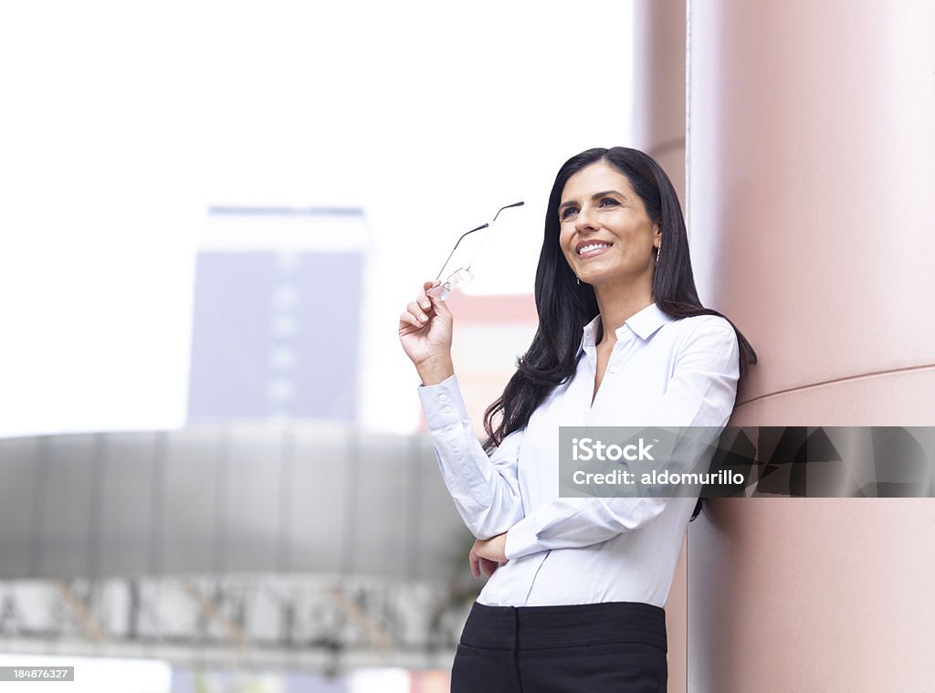 Matura donna d'affari - Foto stock royalty-free di Abbigliamento elegante