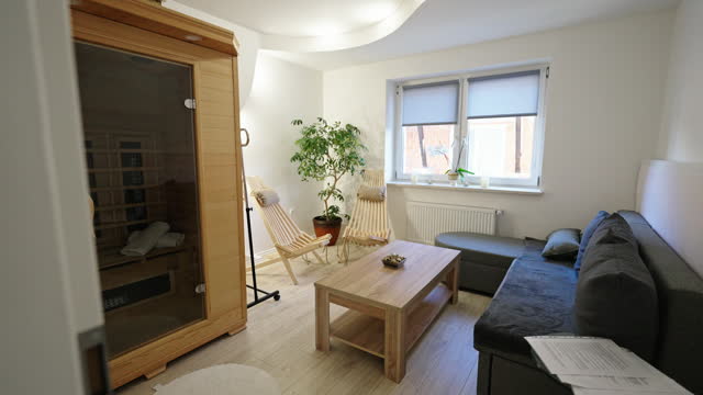 Interior Of Luxury Wellness Center With Comfortable Sofa and Sauna