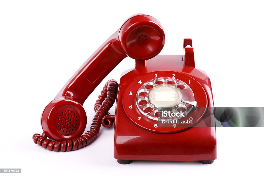 Red Phone Old red telephone isolated on white Telephone Stock Photo