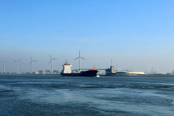 Wijk bij Duurstede, Netherlands, April 28, 2022; Inland vessels sail loaded and unloaded on the Amsterdam-Rhine Canal.