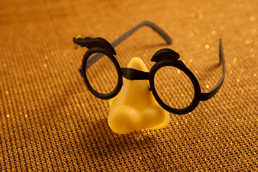 Fake toy plastic glasses with nose.