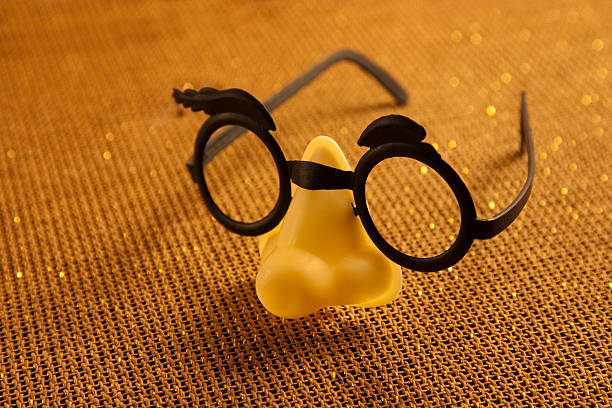Fake glasses Fake toy plastic glasses with nose. groucho marx disguise stock pictures, royalty-free photos & images