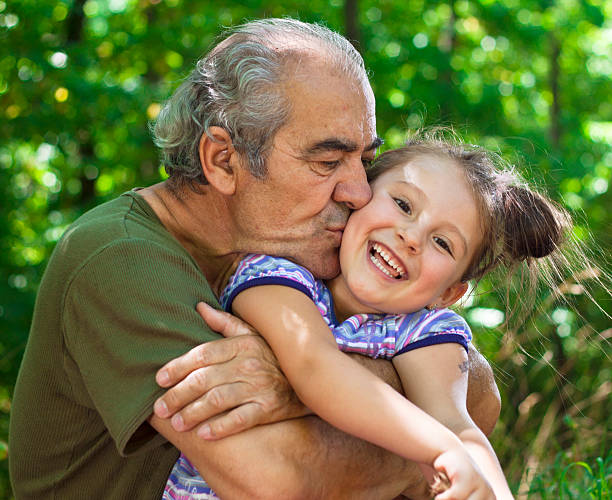 istock Grandpa and kid in nature 184878058