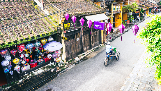 Hoi An, Vietnam, November 20, 2022: Aerial view of a shopping street in the town of Hoi An, Vietnam