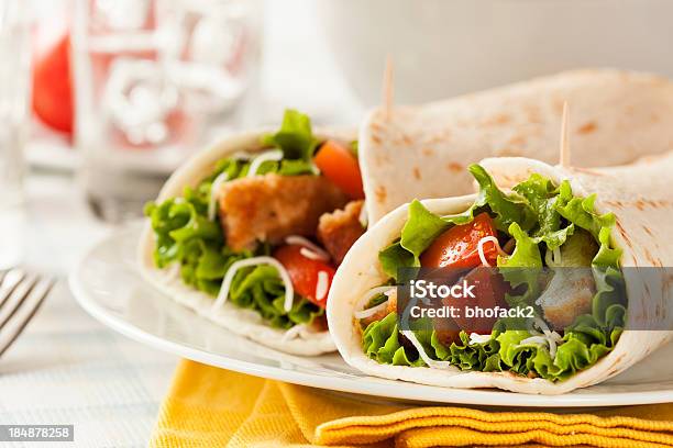 Breaded Chicken In A Tortilla Wrap Stock Photo - Download Image Now - Appetizer, Burrito, Chicken Meat