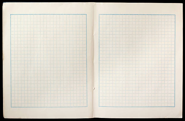 open grid paper book stock photo