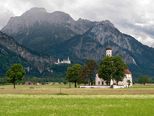 'Hohenschwangau, Germany - July 26, 2015: Neuschwanstein Castle as seen from Marienbruecke, near Hohenschwangau, Germany.'