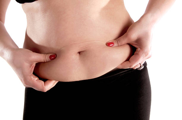 gros ventre - overweight women abdomen pot belly photos et images de collection