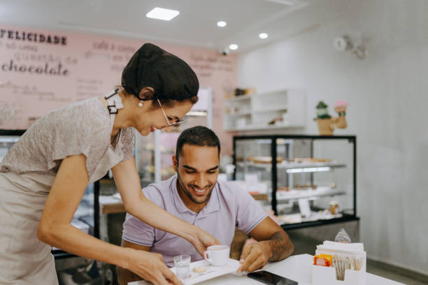 istock Waitress delivering customer order in cafe 1848800886