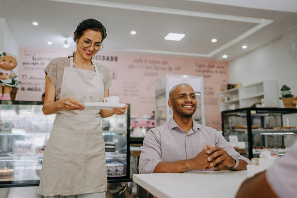 istock Waitress delivering customer order in cafe 1848800887