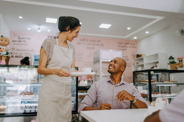 istock Waitress delivering customer order in cafe 1848800888