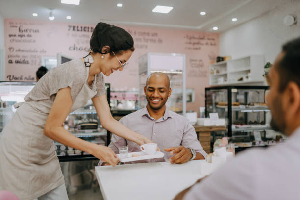 istock Waitress delivering customer order in cafe 1848800890