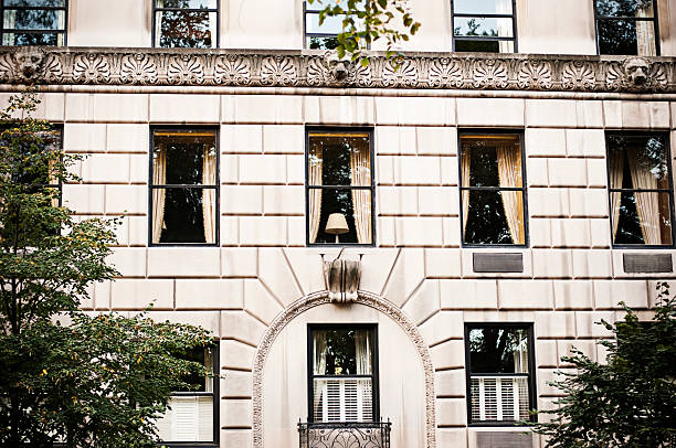 Apartment Building in Manhattan Apartment Building in Manhattan upper east side manhattan stock pictures, royalty-free photos & images