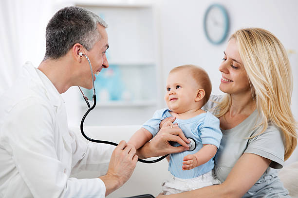 istock Pediatrician checking baby patient. 184880563