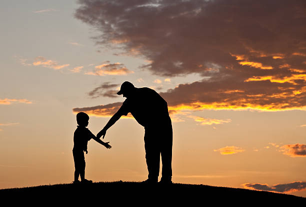 istock Father and Child Silhouette 184880690