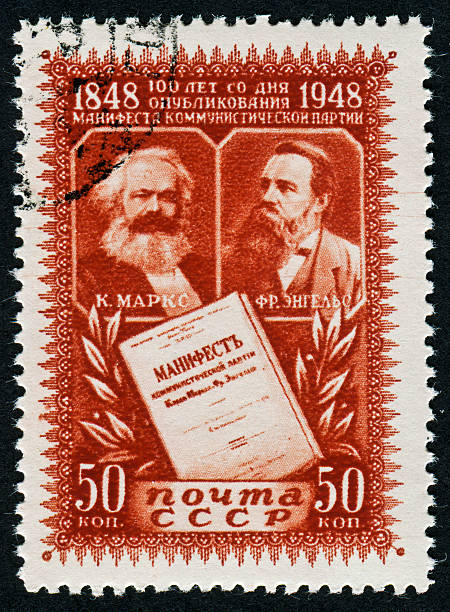 Marx And Engels Stamp Cancelled Stamp From The Soviet Union Featuring The Communists Karl Marx And Friedrich Engels friedrich engels stock pictures, royalty-free photos & images