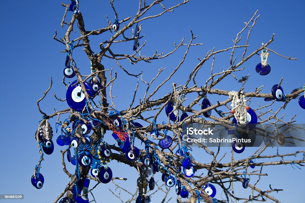 Good luck charms hanging on tree Good luck charms hanging on tree, this is the typical turkish amulet to bring luck ! Animal Body Part Stock Photo