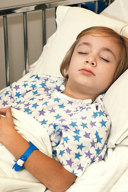 istock Little Boy in a Hospital Bed 184881469