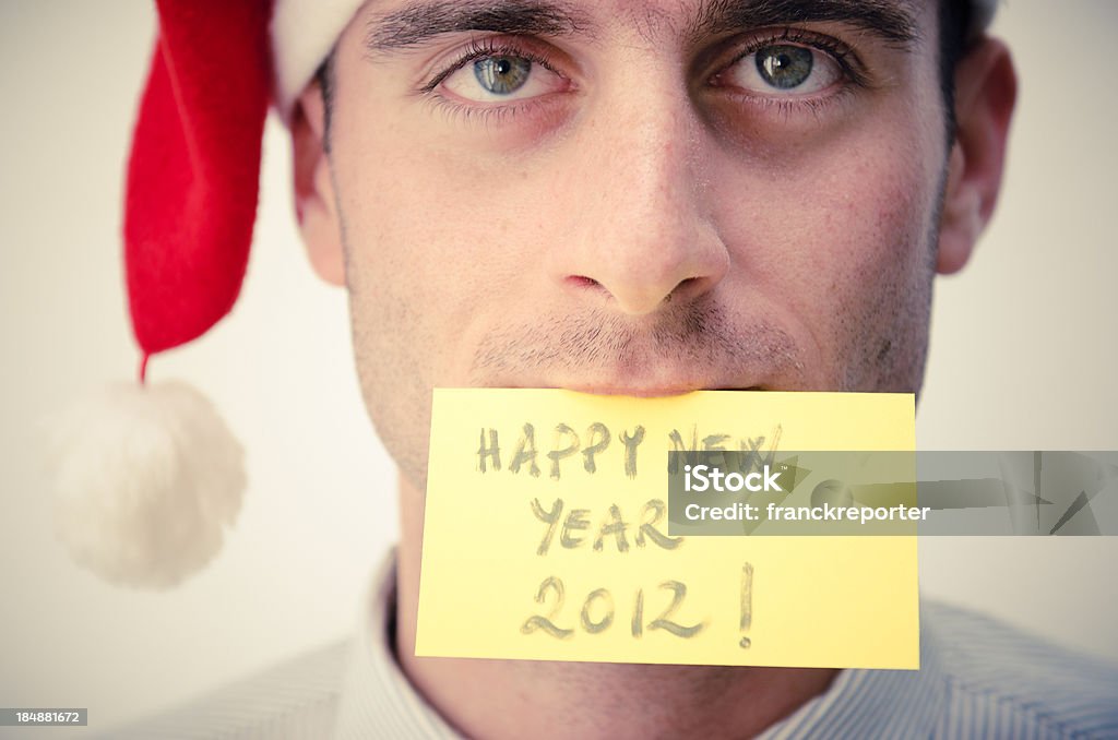 Homem de Negócios fazendo uma feliz Ano Novo com Chapéu do Pai Natal - Royalty-free 25-29 Anos Foto de stock