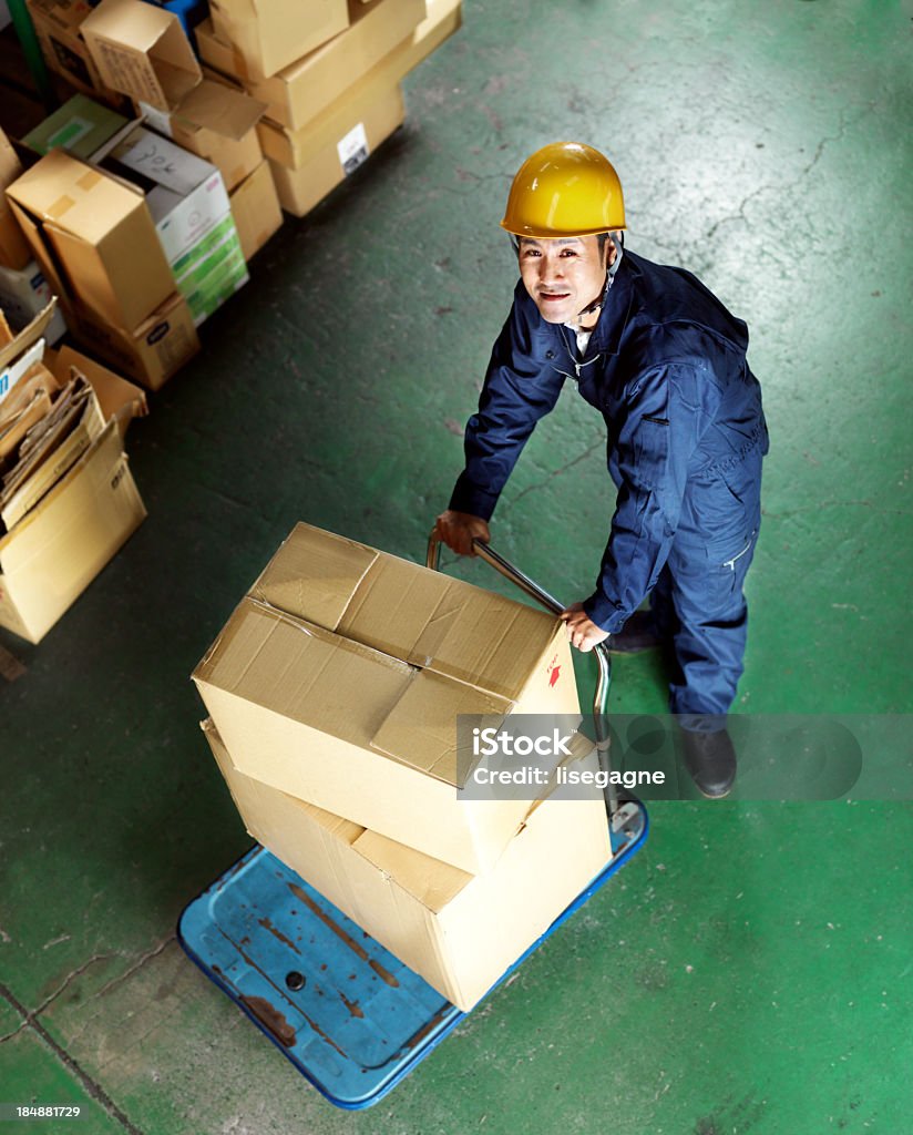 Trabajador almacén - Foto de stock de Cultura japonesa libre de derechos