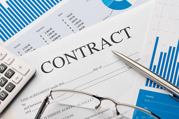 close-up image of договоре на стол - loan business calculator legal system стоковые фото и изображения
