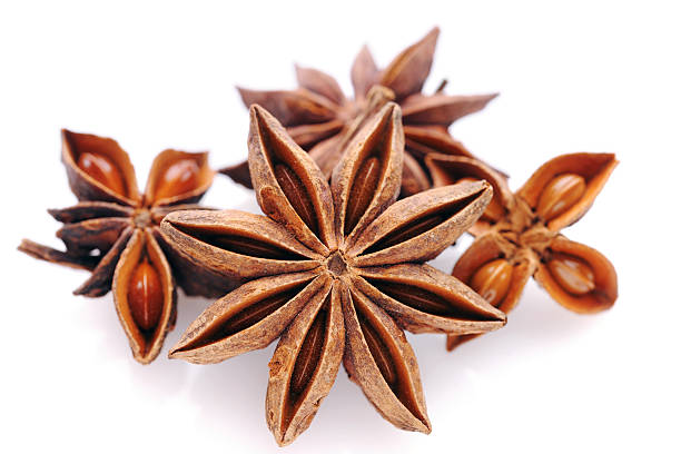 Star anise on white Star anise on white - XXXL Image star anise stock pictures, royalty-free photos & images