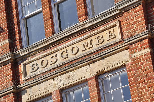 Old Boscombe An old stone sign saying Boscombe (part of Bournemouth in UK). boscombe photos stock pictures, royalty-free photos & images