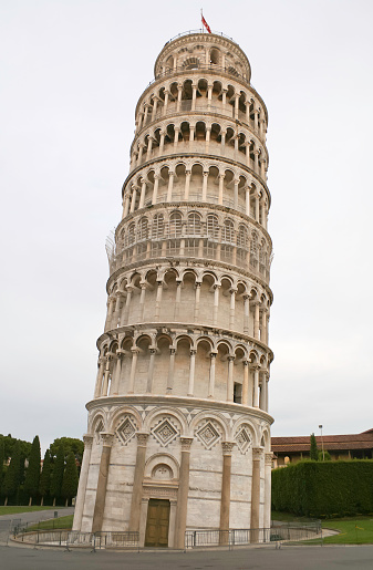 The Leaning Tower of Pisa in Italy during the late afternoon.
