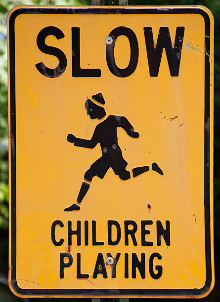 istock vintage slow children playning sign 184883490