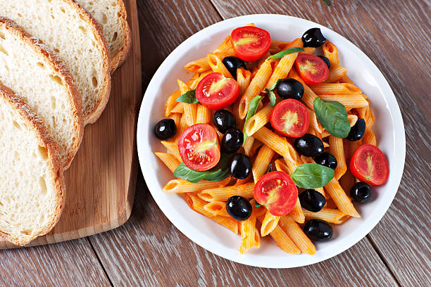 Pasta with tomato sauce and olives
