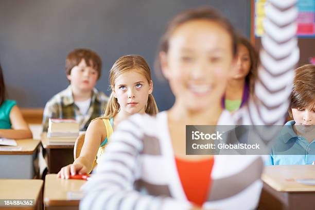 Aburrido School Girl Girar Los Ojos Foto de stock y más banco de imágenes de Girar los ojos - Girar los ojos, Estudiante, Aprender