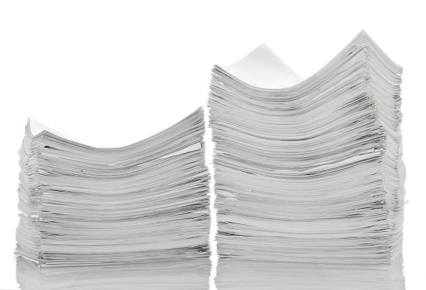 istock Two pile of papers 184884496