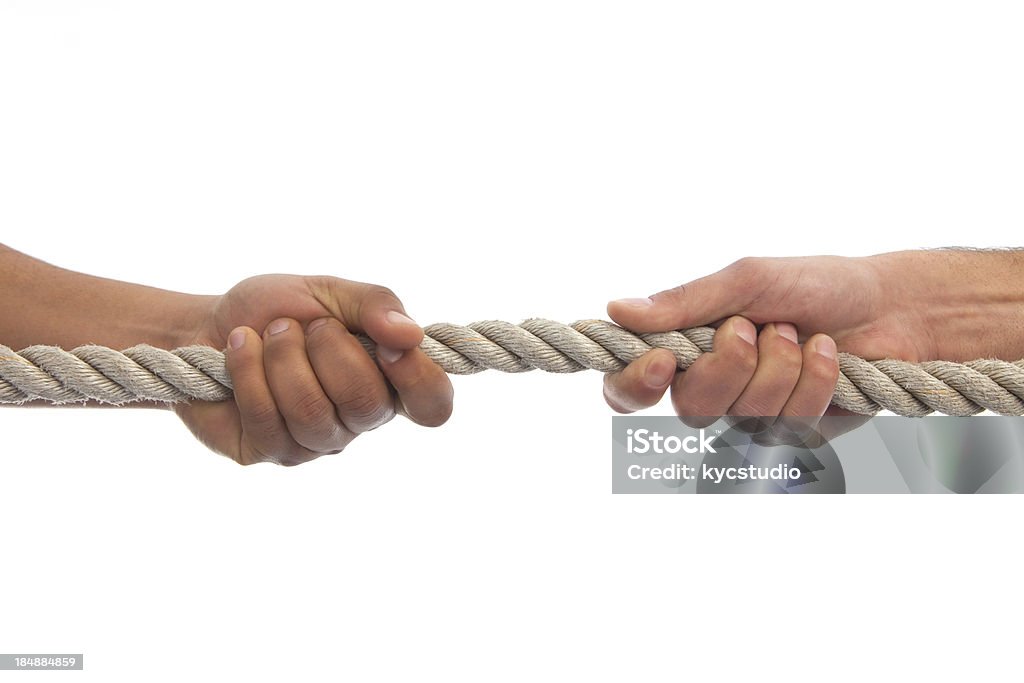 Duas mãos, puxando uma corda - Royalty-free Jogo da corda Foto de stock