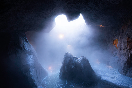 Steamy cave hot springs with rock formations, Banff, Alberta, Canada