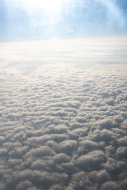 istock Endless sea of billowy clouds seen from an airplane 1848850679