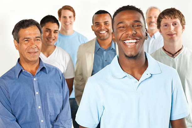 Happy Man In Front Of A Diverse Men Group Stock Photo - Download