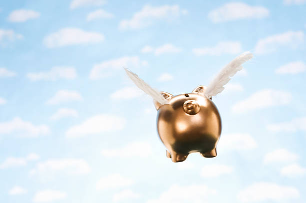 istock Piggy Bank Flying Away 184885556