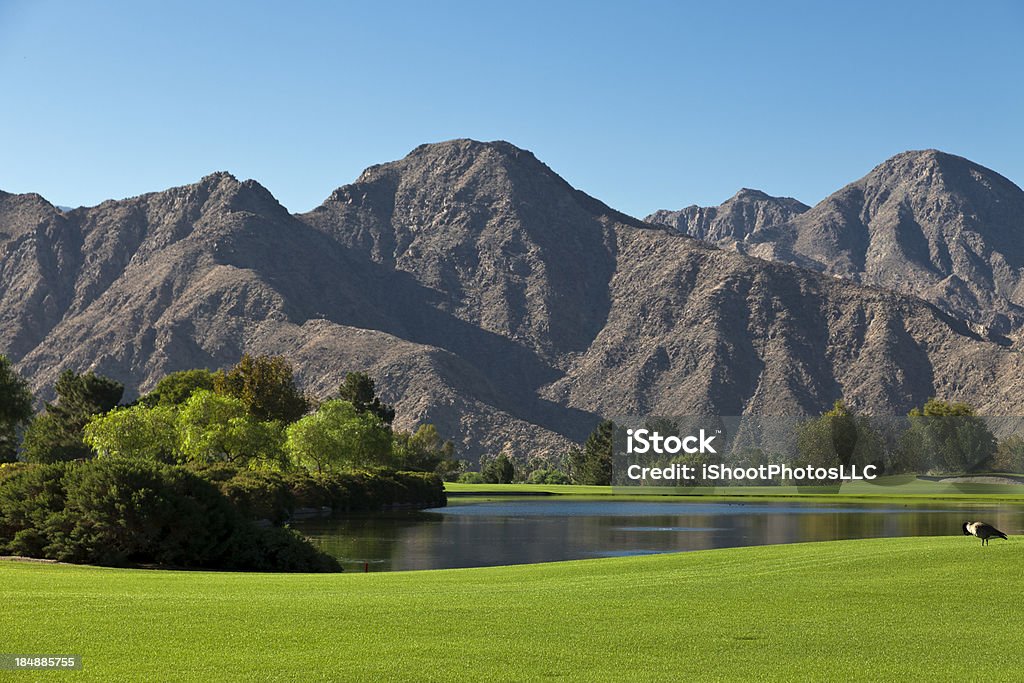 Golf Landscape Picturesque Lake and Mountains golf landscape Indian Wells - California Stock Photo