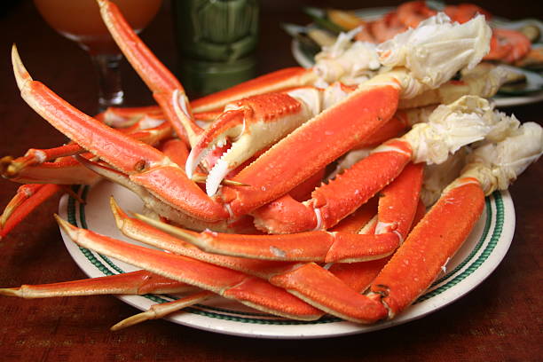 King Crab Legs Seafood delicacy.Plase see my portfolio for many more food photos. crab leg stock pictures, royalty-free photos & images