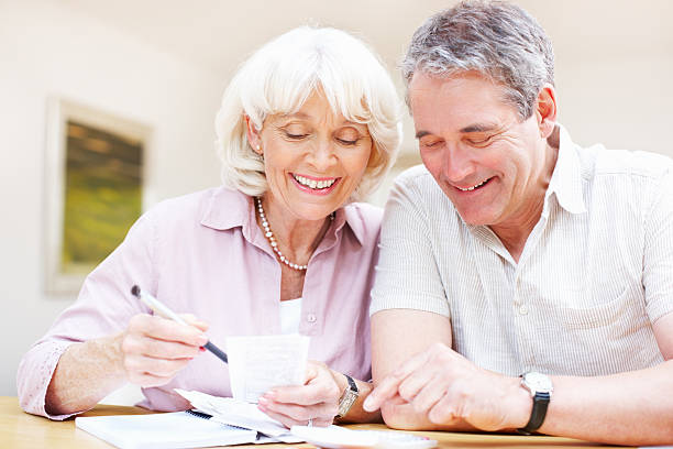 istock Senior couple planning finances 184886494
