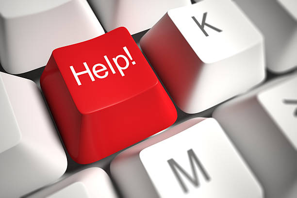 Red Help! key on a computer keyboard.