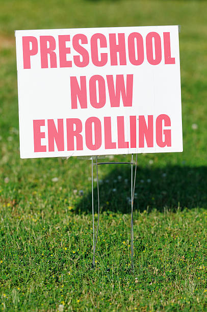 istock Preschool now enrolling sign 184886926