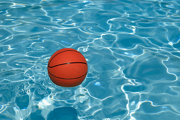 istock basketball floating in a swimming pool 184887800