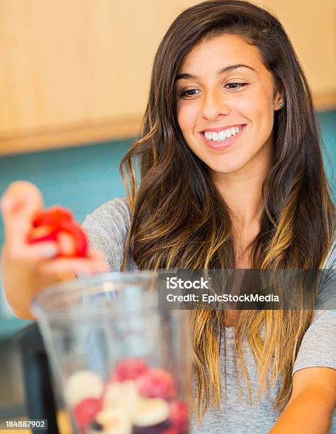 Woman Making Fresh Fruit Smoothie Stock Photo - Download Image Now - Adult, Cafe, Cute