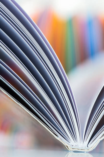 istock Open book pages with colorful toned background 1848938275