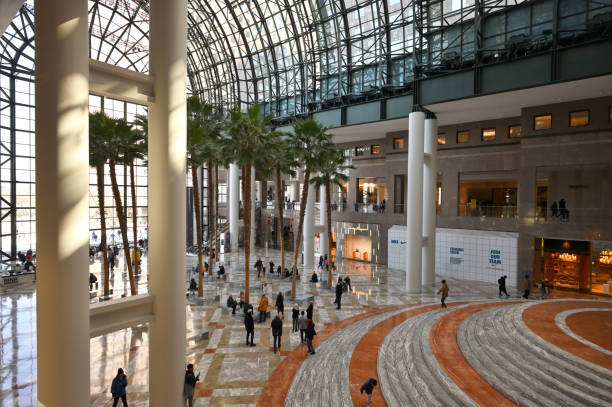 New York City - February 18, 2023: Interior of Winter Garden Atrium, glass-vaulted pavilion in New York City, United States.