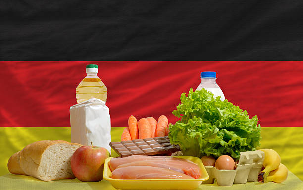 basic food groceries in front of germany national flag